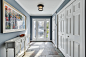 Mid-sized elegant slate floor and multicolored floor entryway photo in Baltimore with gray walls and a white front door