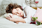 Sweet brunette girl sleeping in her light bedroom in a morning by Daria Cherry on 500px