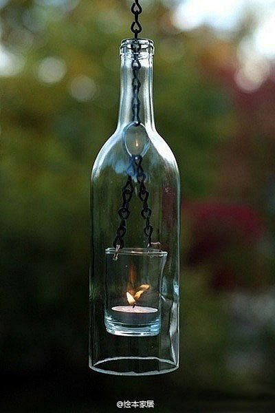 玻璃酒瓶也可以成为挂灯！诀窍在于在瓶颈放...