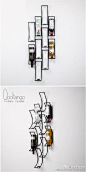 欧式铁艺壁饰 墙上红酒架O网页链接几何形状，百看不厌。一款利用方形做文章的酒架，更是一款创意的壁饰。充分利用镂空的立体空间来形成一种新的视觉，配合墙面的光影显得别具一格。现代、混搭风格居室均适用，酒吧和咖啡馆主打壁饰。#红酒文化#