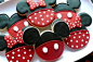 Mickey Mouse and Minnie Mouse decorated cookies.  Minnie's bow is a royal icing transfer.  www.facebook.com/cookiesbycharity