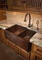 Hammered copper farmhouse sink.