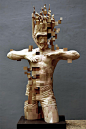 Wood Sculptor Creates Sculpture Of A Submerged Man With A Pixelated Glitch