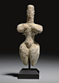 A GREEK TERRACOTTA STEATOPYGOUS FIGURE NEOLITHIC PERIOD, THESSALY, CIRCA 6TH MILLENNIUM B.C.