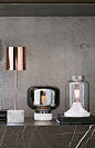 The Beacon Lighting Lowe 1 light table lamp in white marble/black/brass.