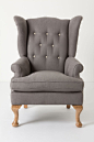 Wingback grey armchair