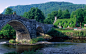 Arch Bridge and Moss Covered House, Wales, UK