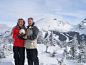 Bride & Groom with their marriage certificate at the top of Banff ski resort.
这张太温情了~