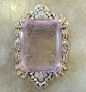 Brooch set with diamonds. In the center is a large cameo carved kunzite  Can also be worn as a pendant.