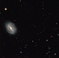 这张图片由哈勃太空望远镜拍摄，图中为一个位于巨蛇座的名为PGC54493的美丽螺旋星系。