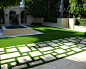 Photo of a large modern partial sun courtyard concrete paver landscaping in Tampa for summer.