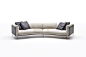 The Piero Lissoni Rod Bean Sofa designed for Living Divani, is a curved style that sits on a minimal frame made of lacquered, drawn tubular steel and stainless steel feet. The sofa is £10,954 at TwentyTwentyOne.