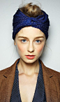 Karen Walker blush, coral lips, and a turban on top