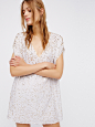 Free People Pop Goes The Party Dress : Pop Goes The Party Dress | This effortless mini shift dress features allover sequin embellishment detailing with short dolman style sleeves and a V-neckline. Lined. 
