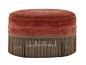 Oval upholstered ottoman