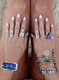Silver accessories and white nails