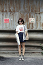 School style - mini pleated skirt - graphic tea and sneakers (Seoul street style):