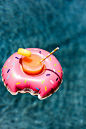 Keep the pool party poppin’ with summer activities. Fill your pool with fun floaties like large inflatable swans and donuts (especially if your friends will be bringing their children). But who said adults can’t have fun floating around too?! Evite Pool P