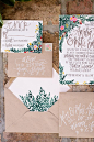 kraft invitation suite with leafy envelope liner, photo by Starfish Studios http://ruffledblog.com/tuscany-inspired-wedding-ideas #weddinginvitations #stationery