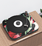 R P 0 1 Turntable : A customizable record player/ turntable that features customizable fabric top to suit your taste/ decor, and a simple front interface that indicates album and song being played as well as volume control.