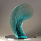 Artist Niyoko Ikuta Uses Layers of Laminated Sheet Glass to Create Spiraling Geometric Sculptures