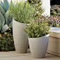 A slight slant to the rim trends these planters from the expected to the delightfully different. Statement pieces flank the door for a contemporary welcome or stage them together, short and tall, for a dynamic display of potted plants. Crafted of a lightw