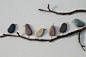 cool idea!  paint small rocks, draw beak on the wall and set the little birds on pretty branches....