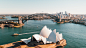 sydney opera house near body of water during daytime