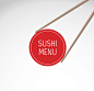 创意夹寿司菜单设计矢量素材，素材格式：AI，素材关键词：日本,菜单,寿司,筷子,日式料理