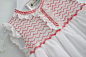 This is right up my alley ... I love red and white smocking!