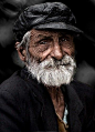 ALTphotos Photography Community.  The old man with wrinkly skin looking straight into the camera. So natural. So much experience from a long life.