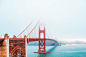 (click to download) The Golden Gate Bridge Partly Covered in Fog FREE Stock Photo