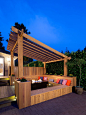 Inspiration for a transitional deck remodel in Vancouver with a fire pit and a pergola