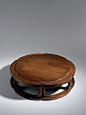 Hexafoil wood stand by Bunroku - Ben Janssens Oriental Art : Japan, dated spring of Showa 11, 1936 Diameter: 16 1⁄4 inches, 41.2 cm Height: 4 inches, 10.1 cm A hexafoil wood stand, the single plank top inset and slightly raised, supported by six legs, eac