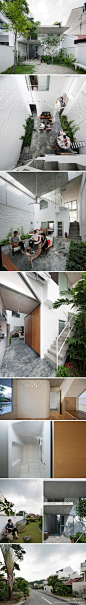 这是一套建造在新加坡中北部郊区小山谷中的住房。房屋中心的起居室被设计成半开放的院子，因此屋内屋外产生了互动，植物、动物和天气变化都成了室内生活的一部分。