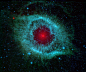 螺旋星雲是一個位於寶瓶座的行星狀星雲，距地球約650光年。它是最接近地球的行星狀星雲之一，於1824年被卡爾·路德維希·哈丁發現。螺旋星雲曾經被稱為上帝之眼。圖為從史匹哲太空望遠鏡拍攝到的螺旋星雲的紅外線影像。 #摄影# #美景#