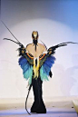 Thierry Mugler’s “Butterfly” dress in black velvet sheath with butterfly wings…