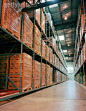 Royalty-free Image: Aisle of warehouse boxes stacked for distribution