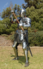 7060314-knight-in-shining-armour-standing-in-attack-position-with-a-battle-axe-Stock-Photo.jpg (815×1300)