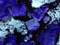migeo:

Purple Fluorite Cubes, Mapimi, Durango (by cobalt123)
Purple Fluorite Cubes, Mapimi, Durango - Cobalt blue cubes of fluorite crystals, purple that tends towards blue, from Mina Ojuela in Mapimi, Durango. Shot through the glass display case, the ce