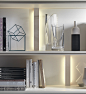 Ample shelf space with built-in lighting in the smart wall unit system