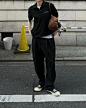 Photo by oksoon kim on May 02, 2024. May be an image of 1 person, wingtip shoes, sweatpants and street.