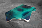 Elegant Marble and Acrylic Glass Table Mimics the Layered Depth of the Ocean Floor