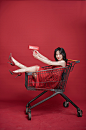 红裙女性购物车新年购物人物摄影图照片