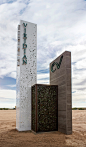 Three vertical volumes create high branding impact. The retainer less illuminated acrylic lettering glows on the 20' tower.