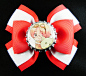 Hetalia Canada Grosgrain Bottle Cap Hair Bow : Axes Powers Hetalia Canada Hair bow;    Made out of quality Grosgrain ribbon, measures around 4 in length and 3 in height. Ribbon has a glossy