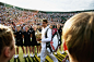 Roger Federer walk off court after winning the 2007 Wimbledon final. 