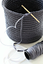 Crochet basket made with tape yarn over plastic tubing