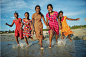 Nat Geo Image Collection 在 Instagram 上发布：“New to the collection! #Children go #swimming in the #ocean for the first time during an outing from their #orphanage in #SriLanka. Photo…”