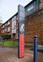 Outdoor freestanding pylon sign at Stockwell Park Estate, UK by Hat-Trick Design